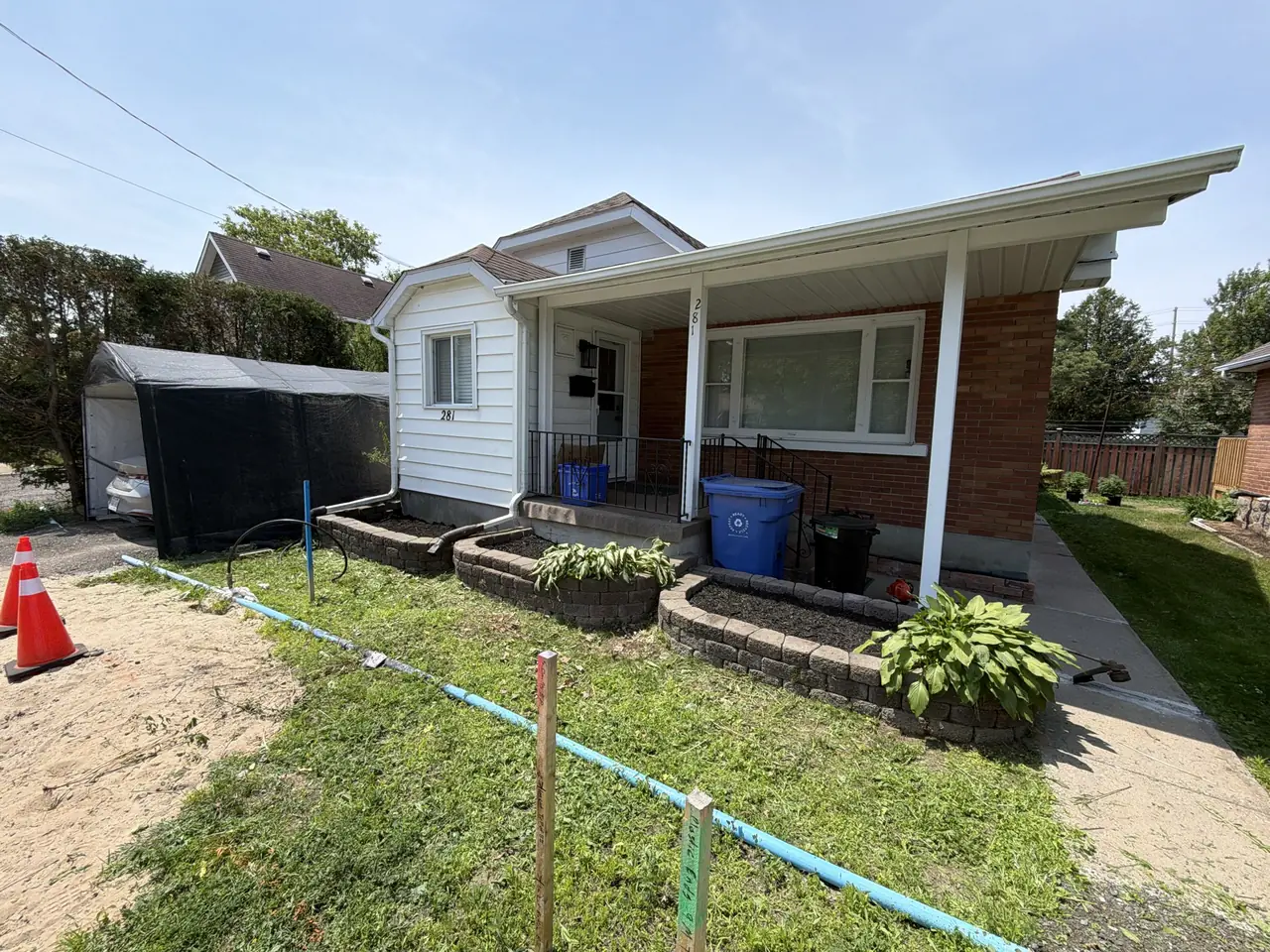 Front yard excavated and regraded with drainage string lines by Edwards Landscape and Construction in North Bay