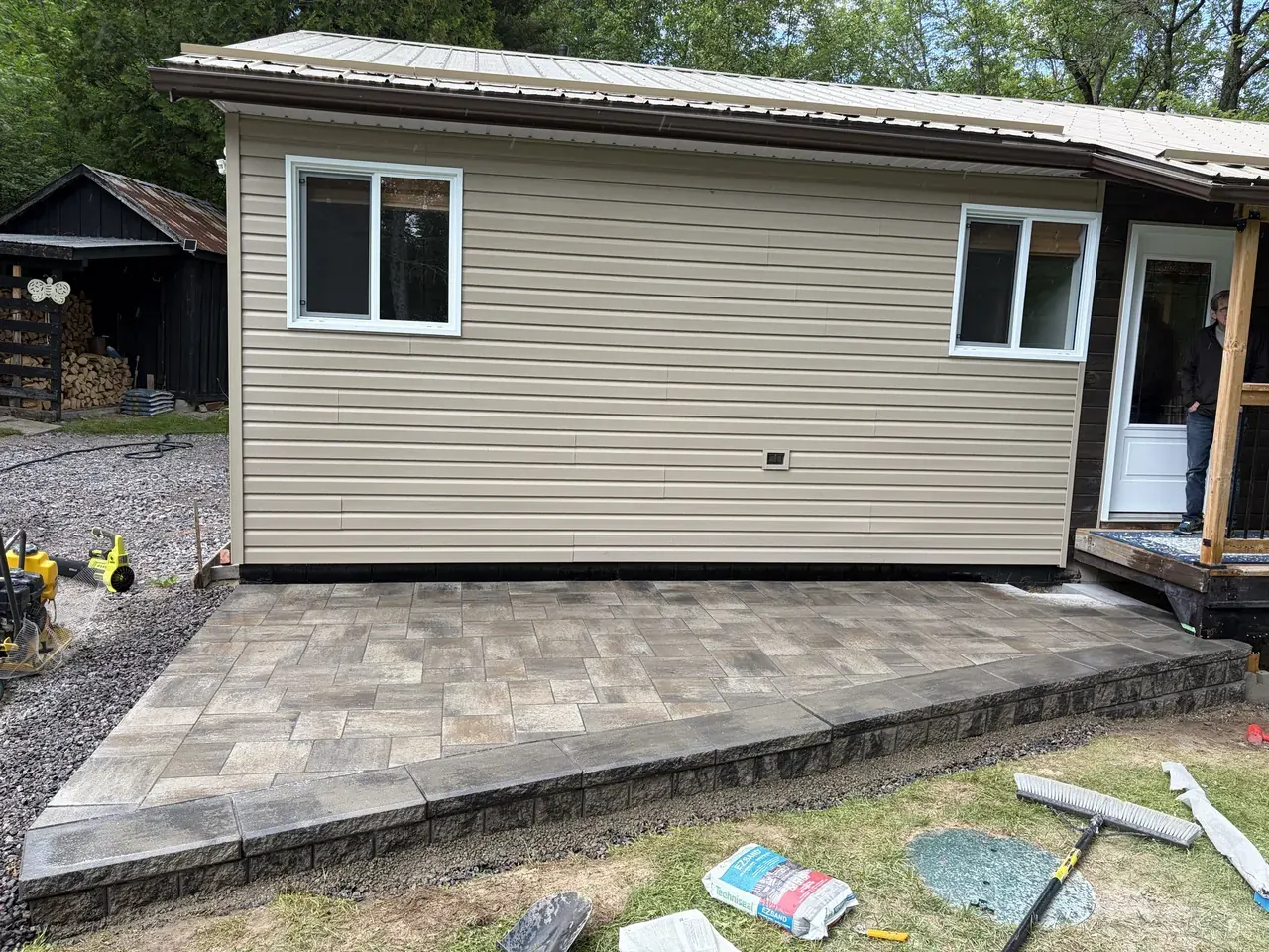 Edwards Landscape and Construction paver patio and landscaping on a Northern Ontario property