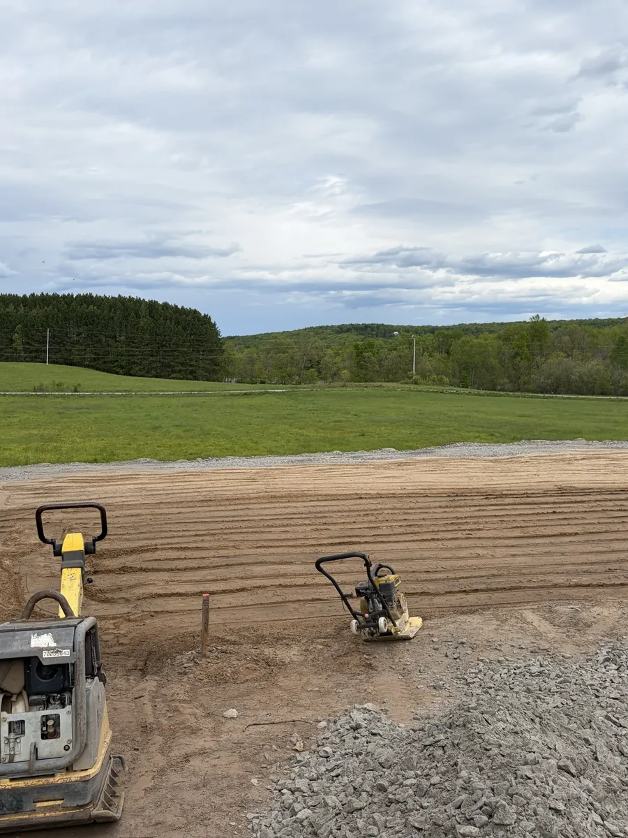 Site excavation and grading with compaction equipment by Edwards Landscape and Construction near North Bay